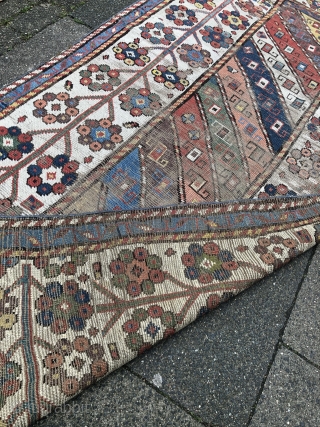 Antique Caucasian rug from an old German collection, good age, very nice colors and beautiful border. Size: ca. 227x111cm / 7'4''ft x 3'7''ft some condition problems but still very collectable.   