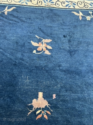 Antique Chinese Peking rug. Very decorative, beautiful blue field color, salmon border. Age: circa 1900, size: ca. 405x310cm / 13’3ft by 10’2ft , some localized wear. www.najib.de      