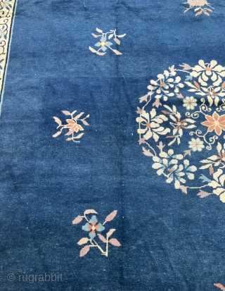 Antique Chinese Peking rug. Very decorative, beautiful blue field color, salmon border. Age: circa 1900, size: ca. 405x310cm / 13’3ft by 10’2ft , some localized wear. www.najib.de      