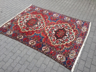 Colorful Persian Bakhtiary rug with lots of flowers and birds, age: circa 1920, size: ca. 205x150cm / 6'7''ft x 5ft             