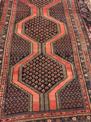 Antique Northwest Persian village rug from the Meshkin area. A perfect interaction between the pole medallion and the field design seperated by a brick red plane field. Size: ca. 405x155cm / 13'3''ft  ...