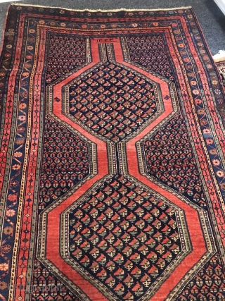 Antique Northwest Persian village rug from the Meshkin area. A perfect interaction between the pole medallion and the field design seperated by a brick red plane field. Size: ca. 405x155cm / 13'3''ft  ...