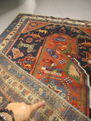 ref: S250 / KUBA SEICHOUR  , CAUCASIAN ANTIQUE RUG 19TH CENTURY , VERY UNUSUAL RUG WITH A LOT OF ANIMALS INSIDE "A CAUCASIAN ZOOLOGICAL RUG"  , one side is repaired.  ...