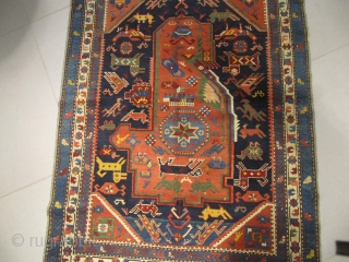 ref: S250 / KUBA SEICHOUR  , CAUCASIAN ANTIQUE RUG 19TH CENTURY , VERY UNUSUAL RUG WITH A LOT OF ANIMALS INSIDE "A CAUCASIAN ZOOLOGICAL RUG"  , one side is repaired.  ...