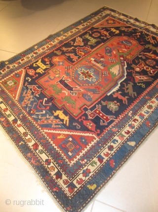 ref: S250 / KUBA SEICHOUR  , CAUCASIAN ANTIQUE RUG 19TH CENTURY , VERY UNUSUAL RUG WITH A LOT OF ANIMALS INSIDE "A CAUCASIAN ZOOLOGICAL RUG"  , one side is repaired.  ...