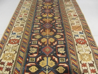 a) Kuba Caucasian rug, 19th century, perfect condition
size: 290 X 0.95  /  9' X 3'                