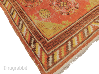 This antique hand-knotted Khotan rug is a stunning piece of Asian culture from the early 20th century. Measuring 4'1"x 7'10", it features a geometric pattern in multicolor wool, with a pile height  ...