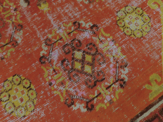 This antique hand-knotted Khotan rug is a stunning piece of Asian culture from the early 20th century. Measuring 4'1"x 7'10", it features a geometric pattern in multicolor wool, with a pile height  ...