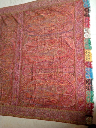 Rare master peace of antique Kashmir shawl Beautiful coloures and very long .excellent weaving 
 It has some moth  holes but over good condition . It measures 11 feet long and  ...