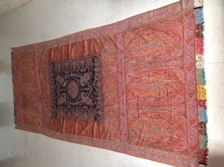 Rare master peace of antique Kashmir shawl Beautiful coloures and very long .excellent weaving 
 It has some moth  holes but over good condition . It measures 11 feet long and  ...