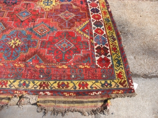 Central Asian Kirghiz or Uzbek Carpet
Size: 6.10-7.1 (width varies) x 11.4 w/skirt.
Needs sidecord work and repairs to skirts. 
As is: $2500.00 PRICE REDUCED!          