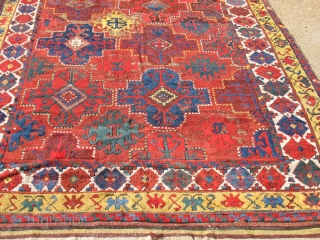 Central Asian Kirghiz or Uzbek Carpet
Size: 6.10-7.1 (width varies) x 11.4 w/skirt.
Needs sidecord work and repairs to skirts. 
As is: $2500.00 PRICE REDUCED!          