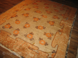 Chinese carpet 8 by 9  Most unusual design, has the handle of an old Peking.Blackish Browns are oxidized.              