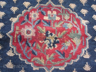 Tibetan khaden, elegant overall frog's foot design on deep indigo ground,cwith a classic running swastika main border and a striking central design with flowers on a good red ground, The four corner  ...
