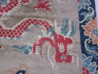 Tibetan: Plush khaden, Two red dragons seeking the flaming pearl, framed by indigo ground main border. Excellent condition, c.1920              