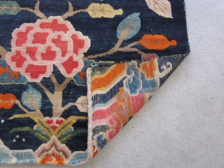 Tibetan : Khaden : Lotuses and other floral elements on saturated indigo ground. Tree of life motif. Foldover shot shows some small repair to lower selvedge, c.1930      