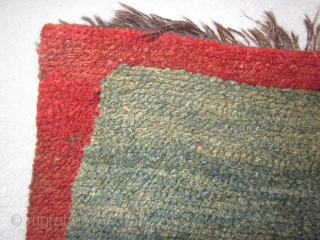 Tibetan, small khaden, attractive abrashed indigo ground, good red, before 1900                      