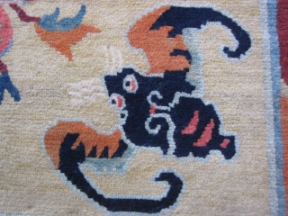 Tibetan mat, abt 3 by 3 ft, c.1930 Sinicized design with four hungry bats ready to feast on the three fruits            