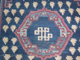 Tibetan: Khaden, about 3 by 6 ft., chunky feel, before 1900 frog's foot design, endless knot motif, some repair. Inexpensive             