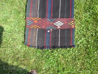 Beduin: Narrow kilim probably made in Jordan on a back strap loom c.1950. Rich colors include some hot dyes. Size: 19 by 162 inches. See last shot for small hole, the only  ...