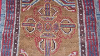 Tibetan sitting mat with eccentric double dorjee, 30 by 30 inches.Village weaving, probably before 1900.                  