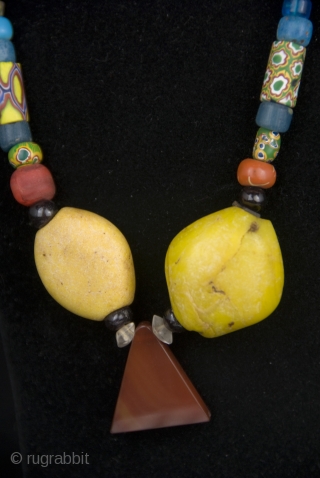 Old Millefiori, Venice mixed, Gablonz, Bohemia, yellow Kiffa glass beads, from Mauritania. Adrar region.

size: 

lenght: 33 cm

diameter of beads: 0,5 cm-3,0 cm           