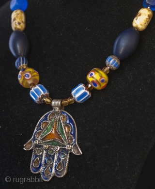 Enameled silver Hamsa amulet from Morocco, mixed Venice and Bohemian glass beads necklace.

Price is including recorded mail international shipping Paypal accepted
            