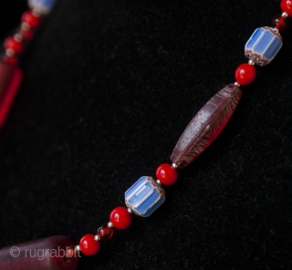 Pashtun silver amulet and old red Gablonz Czech beads necklace

price is including recorded mail international shipping Paypal accepted               