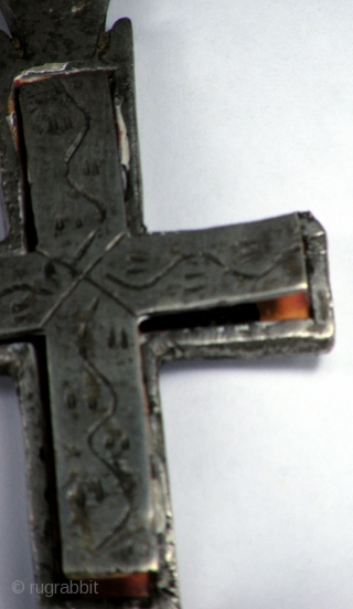 OLD COPTIC CROSS WITH ICON INSIDE

Old big silver metal Coptic cross amulet with painted icon inside. From Ethiopia

SIZE: 13 cm x 7 cm          