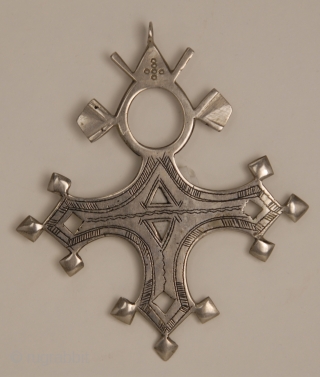 Bartchakea Tuareg Cross,  silver hand made amulet from Niger, region of Bartchakea. On the back side a sign represents artisan signature
Tuareg crosses are mostly worn by men and they are handed  ...