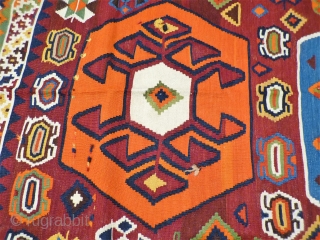 A remarkable antique Qashqai kilim with a dramatic design consisting of three large medallions, and the field filled with scattered motives throught.  The wool soft, shinny and finelly spun.In mint condition.  ...