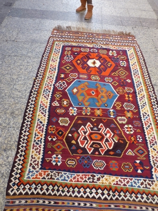 A remarkable antique Qashqai kilim with a dramatic design consisting of three large medallions, and the field filled with scattered motives throught.  The wool soft, shinny and finelly spun.In mint condition.  ...