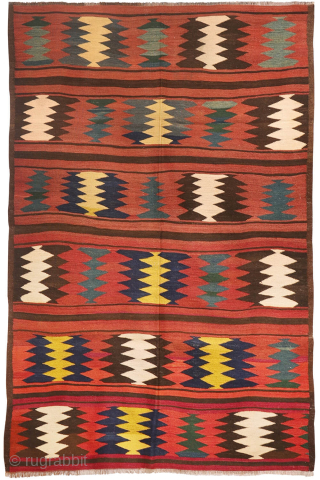 An antique Turkman Labijar from Afghanistan, woven with finely spun wool.

 

The design is composed of motifs arranged in horizontal bands running across the surface of the kilim, alternating with plain bands  ...