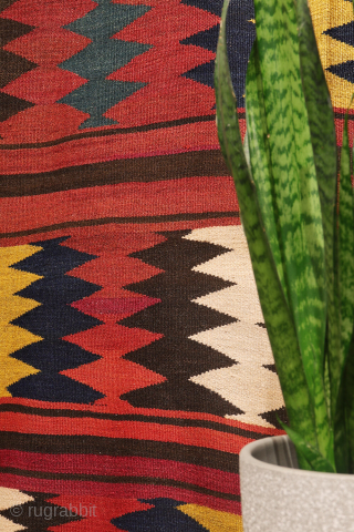 An antique Turkman Labijar from Afghanistan, woven with finely spun wool.

 

The design is composed of motifs arranged in horizontal bands running across the surface of the kilim, alternating with plain bands  ...