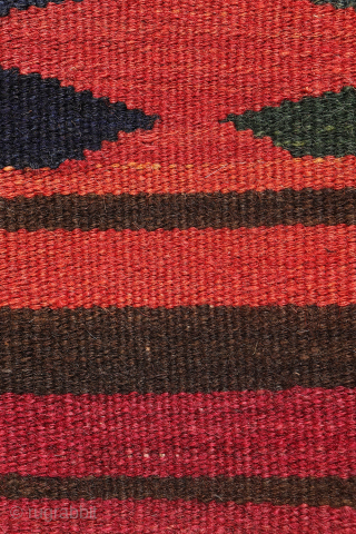 An antique Turkman Labijar from Afghanistan, woven with finely spun wool.

 

The design is composed of motifs arranged in horizontal bands running across the surface of the kilim, alternating with plain bands  ...