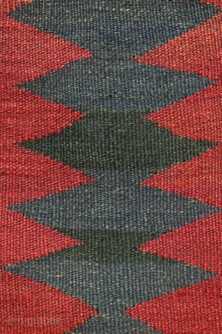 An antique Turkman Labijar from Afghanistan, woven with finely spun wool.

 

The design is composed of motifs arranged in horizontal bands running across the surface of the kilim, alternating with plain bands  ...