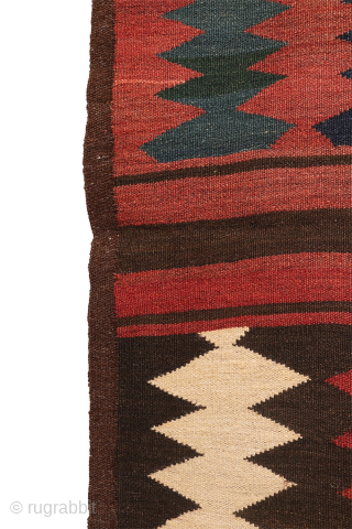 An antique Turkman Labijar from Afghanistan, woven with finely spun wool.

 

The design is composed of motifs arranged in horizontal bands running across the surface of the kilim, alternating with plain bands  ...