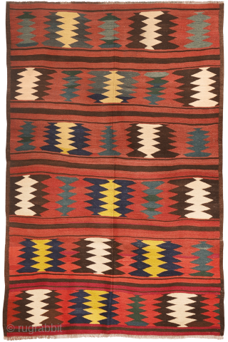 An antique Turkman Labijar from Afghanistan, woven with finely spun wool.

 

The design is composed of motifs arranged in horizontal bands running across the surface of the kilim, alternating with plain bands  ...