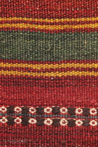 An antique kilim woven by an Uzbek weaver from Northern Afghanistan. The harmonious composition is achieved through the combination of wide plain bands with narrower bands decorated with small floral motifs, their  ...