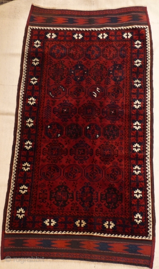 Extremely fine Beluch with velvety wool and a floppy handle. Lots of different guls, little animals and scattered motifs.Full pile, wool on wool. 180x97cms including the long kilim ends (154x97cms the pile  ...