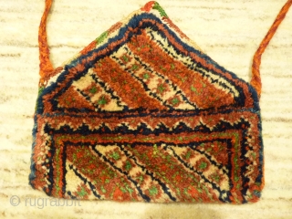 Arabic nomads (southern Iran) tobacco or money pouch, 24x12cms, woven in one piece with thick soft wool pile, from about 1940.            