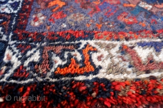 
A very freely designed saddlebag woven by Arabic tribes from South West Iran, with a mixture of flower, plants and botehs that contrasts with a more formal border. Very loooooong pile, with  ...