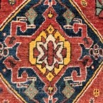 A Qashqai tribe rug with a central medallion, a central field full of floral bouquets, even the borders are arranged with flowers. All dyes are natural, achieving a pretty range of terracotas,  ...