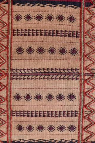 A kilim woven in the Sistan region by Serkhat Beluch weavers. For the lenghtwise borders a different technique has been chosen adding volume to the kilim. All natural dyes. 79x42cms. 1900s. (K1710061).  ...