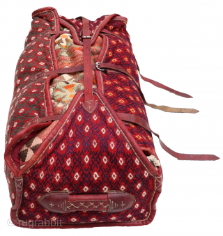 This bedding suitcase or mafrash from the Luri or Qashqai tribe is slightly smaller than usual for mafrashes. All dyes are natural. The interior of the bag has a cotton cloth throught.  ...