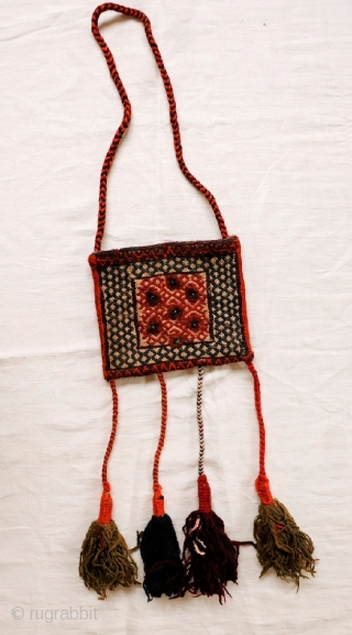 Cute small little bag woven by Bakhtiri nomads from Iran. It combines kilim and knotted areas. Both sides of the bag are worked (back and front). All natural dyes except for the  ...