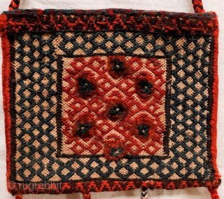 Cute small little bag woven by Bakhtiri nomads from Iran. It combines kilim and knotted areas. Both sides of the bag are worked (back and front). All natural dyes except for the  ...