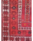 This prayer rug has a more formal border that constrasts with an unusual mihrab surrounded by two water jugs and randomly scatered motives. Tightly woven with nice shinny wool. The area where  ...