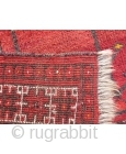 This prayer rug has a more formal border that constrasts with an unusual mihrab surrounded by two water jugs and randomly scatered motives. Tightly woven with nice shinny wool. The area where  ...