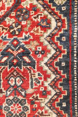 This antique Qashqai rug from Iran truly ticks all the boxes: it is in mint condition, with a full pile, exceptionally soft wool, and a highly intricate design. This level of detail ...